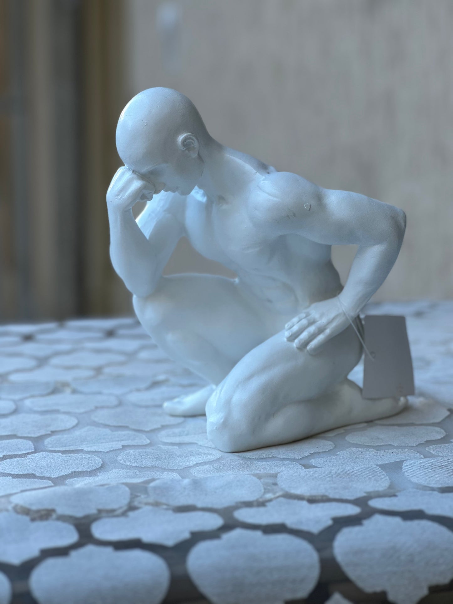 Pensatore Inginocchiato