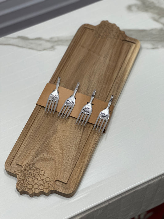 Tagliere formaggi con posate