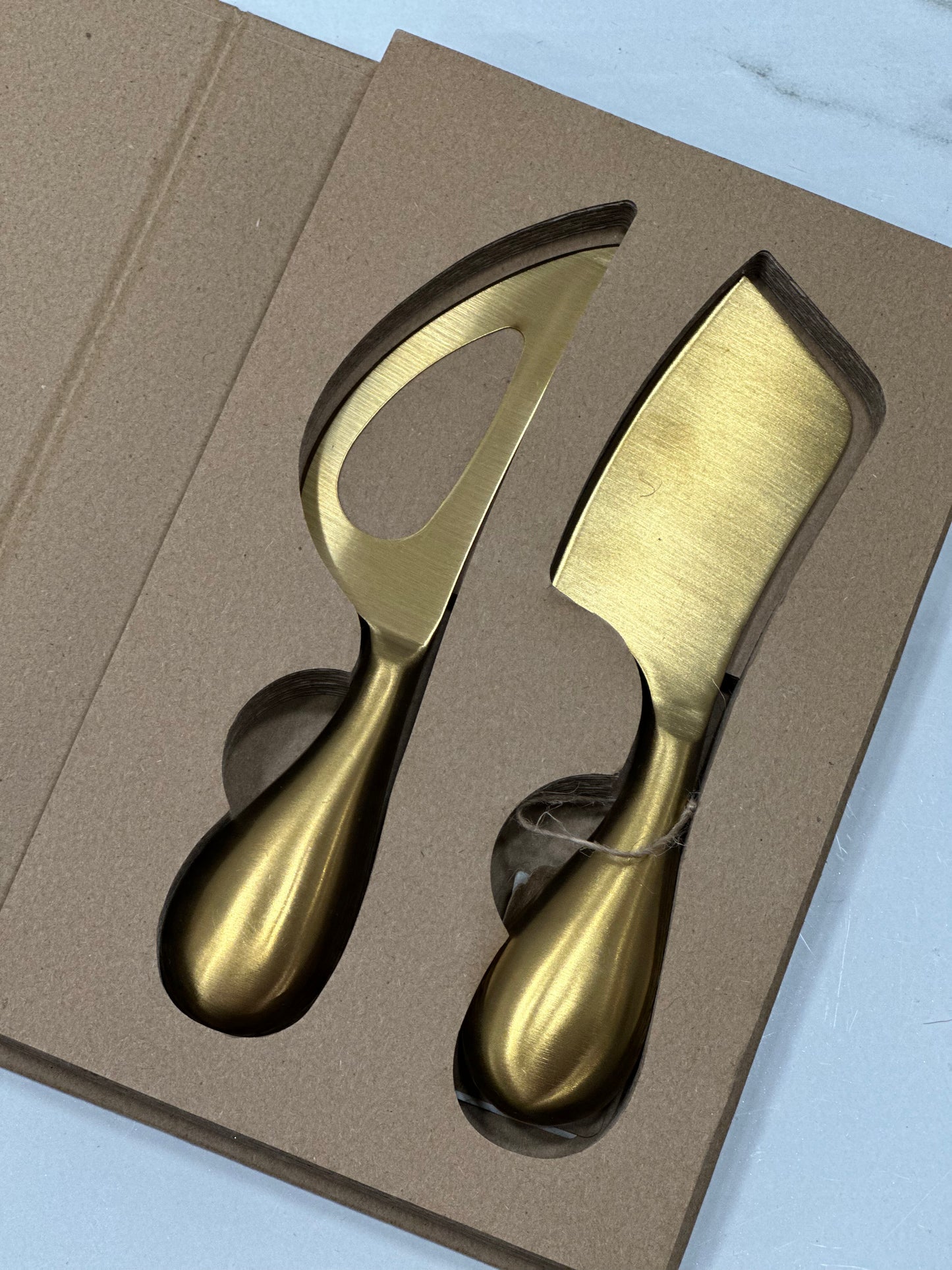 Spalma formaggio oro