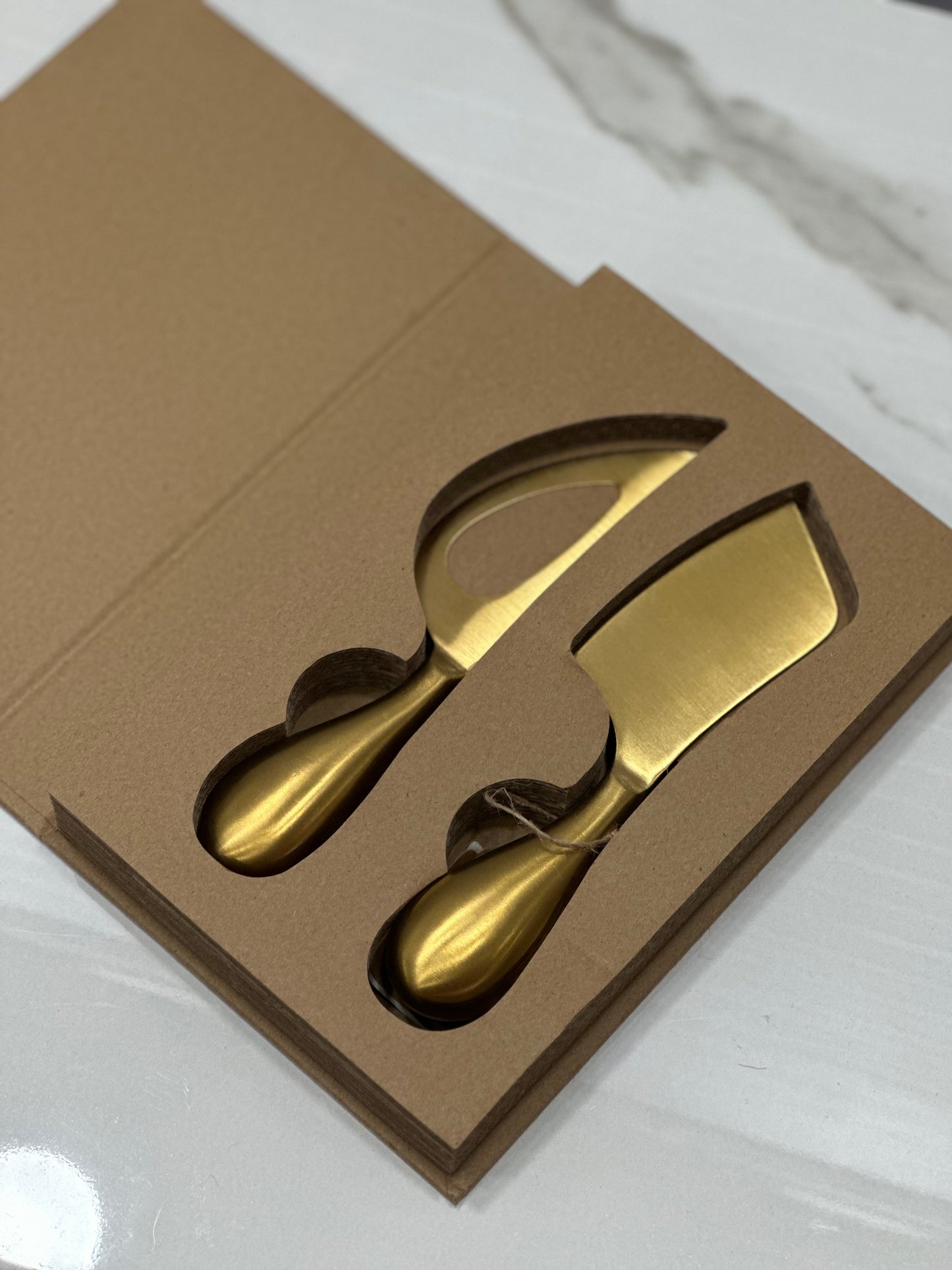 Spalma formaggio oro